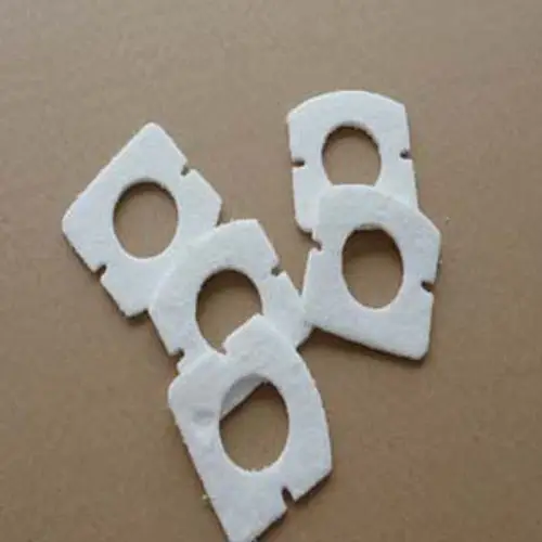 Weiße Dichtungen aus einem Material mit kreisförmigen Ausschnitten, geeignet für Schauglas-Anwendungen. Ein Produkt von Remeha.